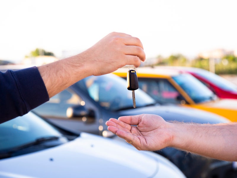 Handing over the car keys to a customer